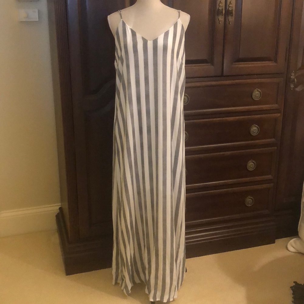 Cotton, mid-length, comfy and has pockets